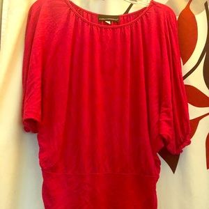 Isabella Rodriguez Red blouse